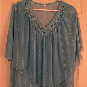 Light teal layered blouse. Fits like a large.